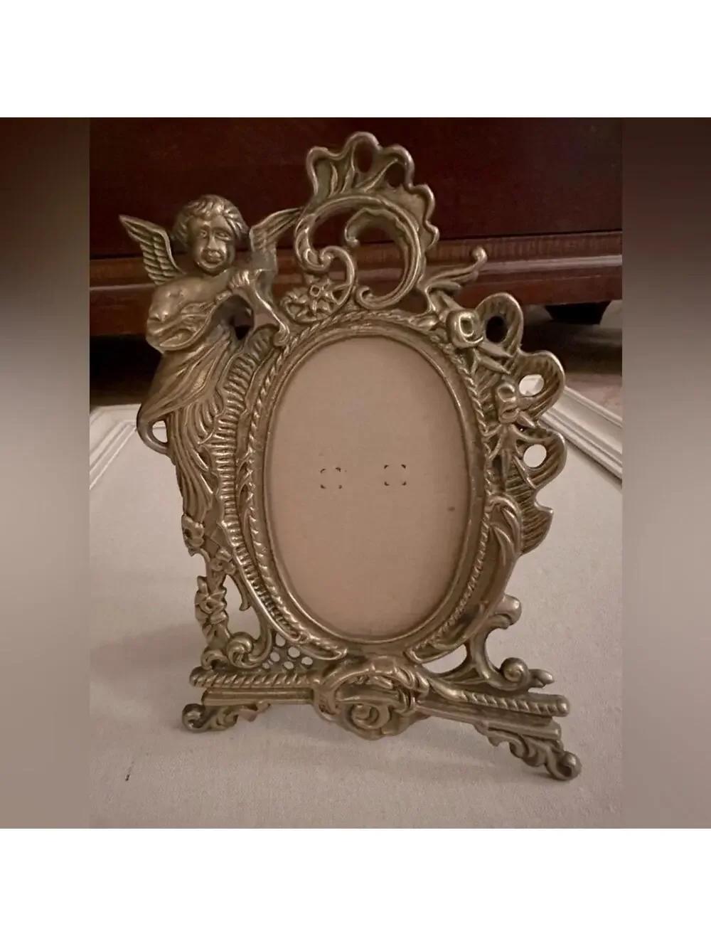 Vintage ornate pewter silver frame with angel and a lyre, amazing detail